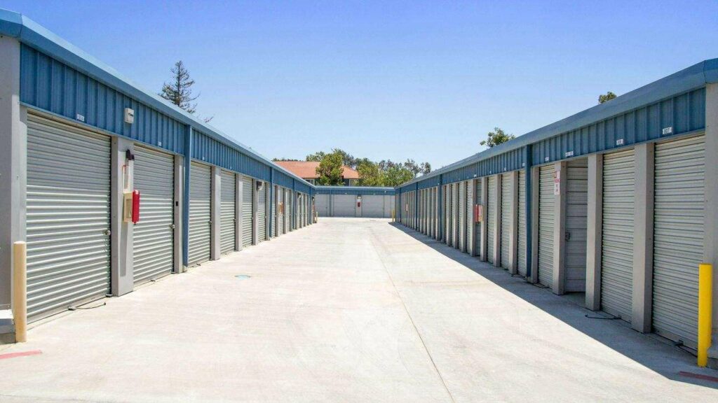 A row of outdoor storage units with small and large unit sizes in a clean area
