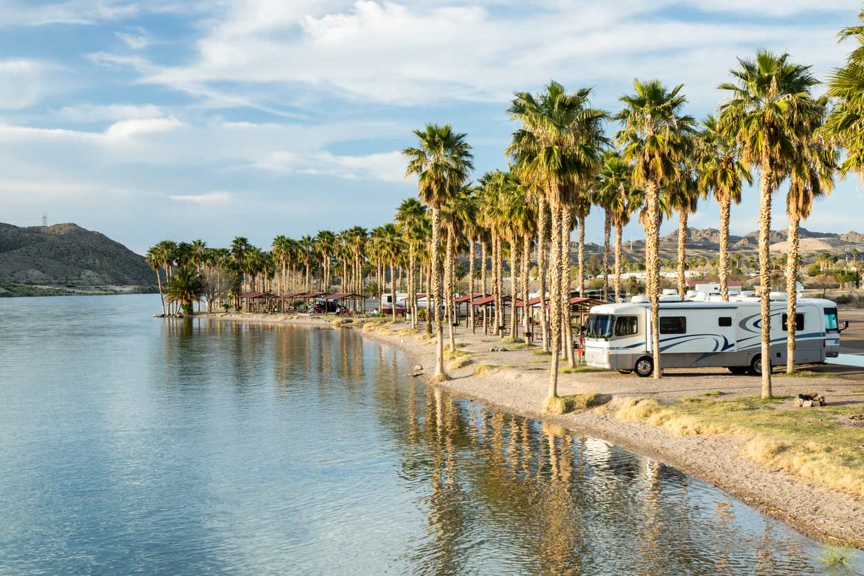RV Campers parked at a desert lake in the southwest United States.
